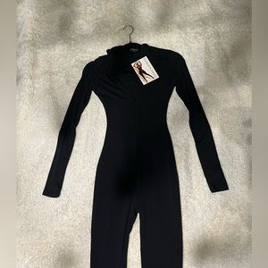 Naked wardrobe jumpsuit with zip in front